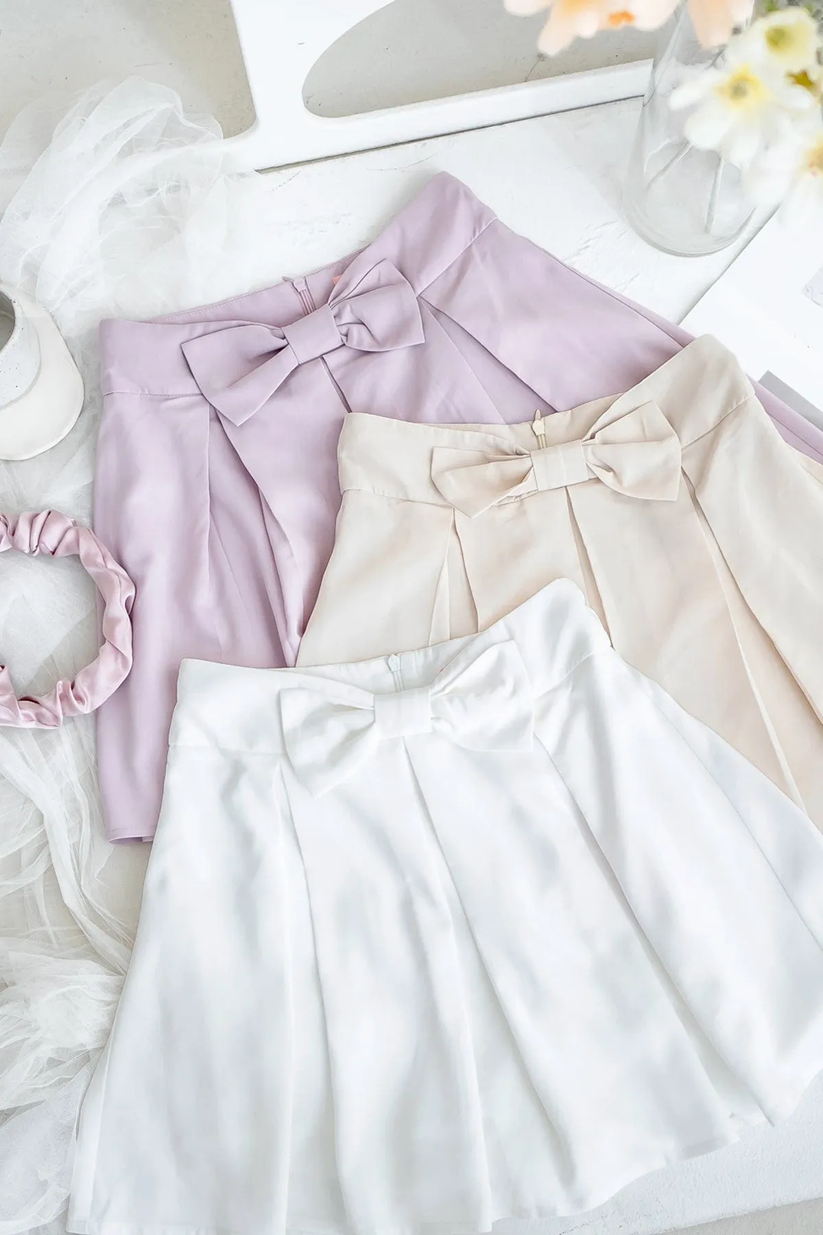 COSETTE RIBBON PLEATED SKORTS IN LATTE